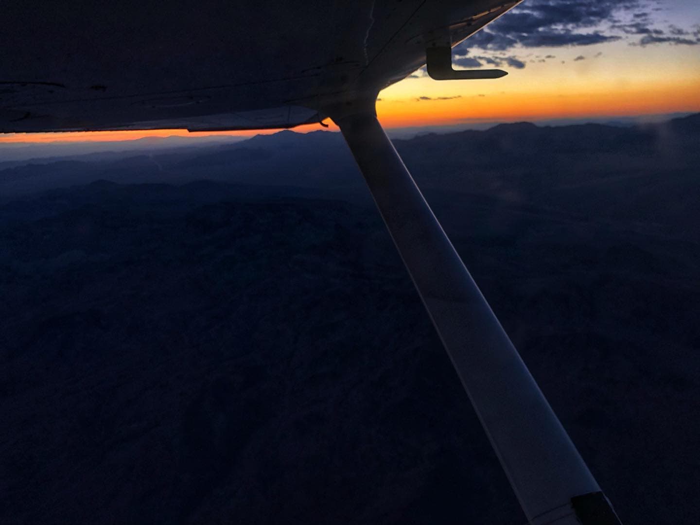 Southwest sunset from aircraft wing